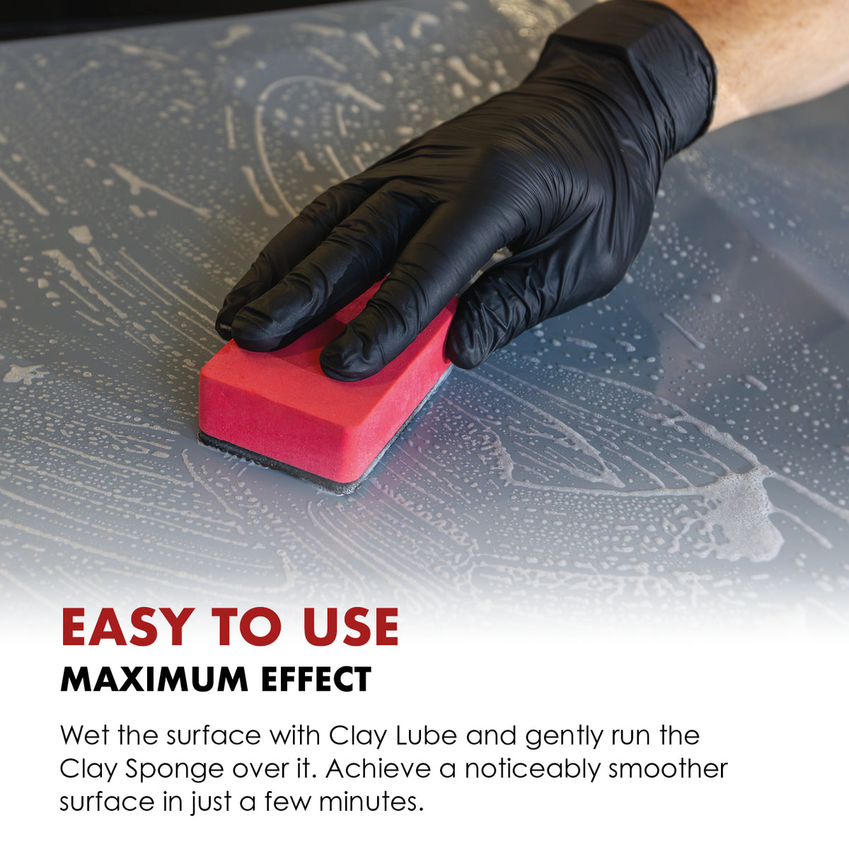 Safe-Shield Clay Sponge used by hand on lubricated car paint.