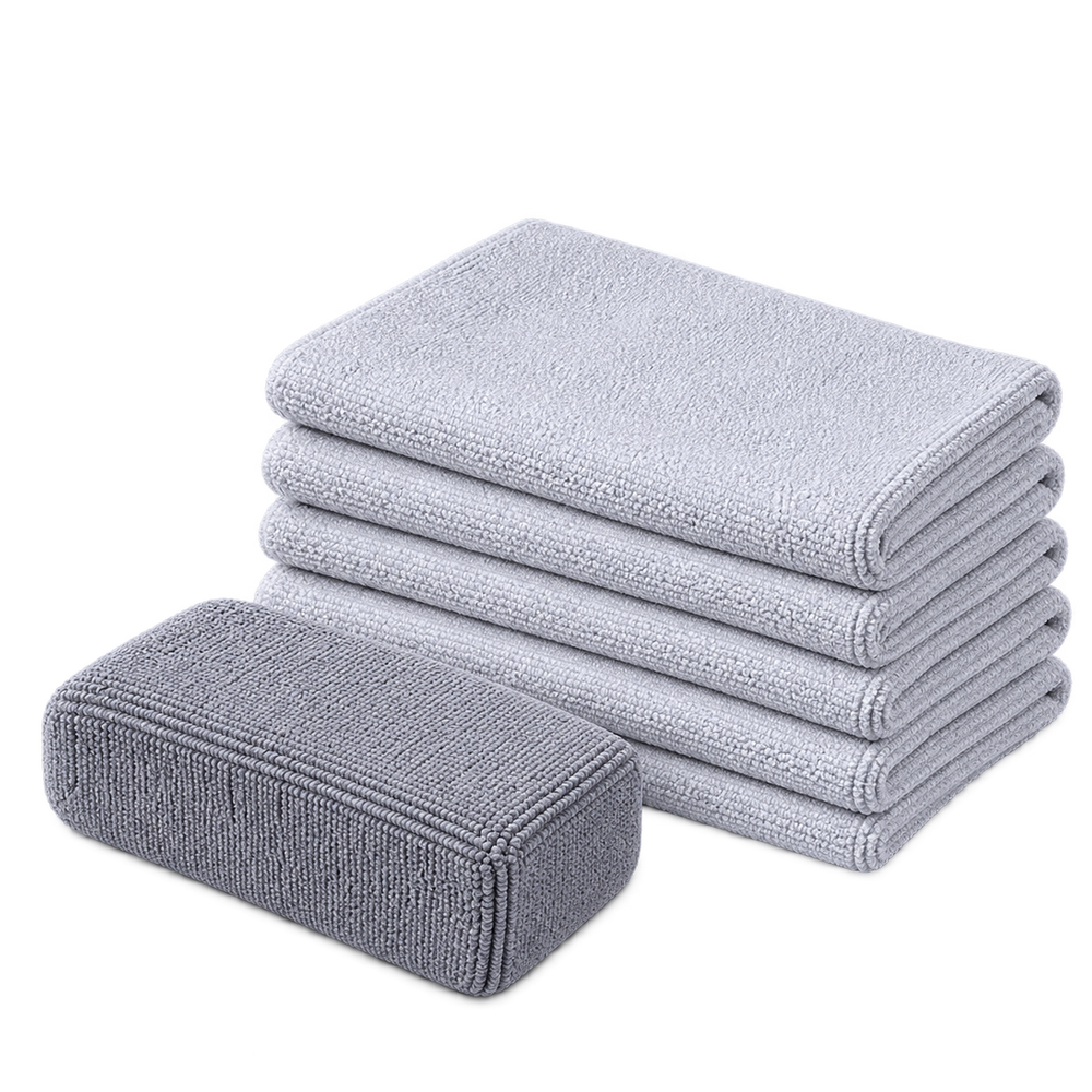Soft-Coat application accessories with one large microfibre sponge and five grey 300 gsm microfibre cloths.